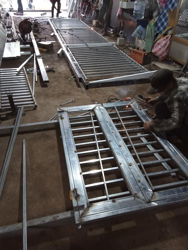 sửa cửa sắt thủ đức